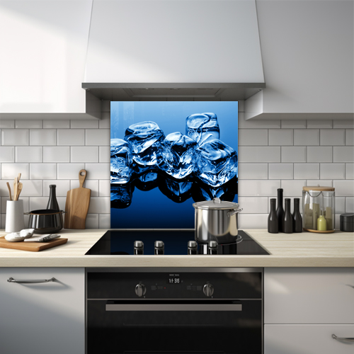 5 ice cubes on a reflective surface splashback.