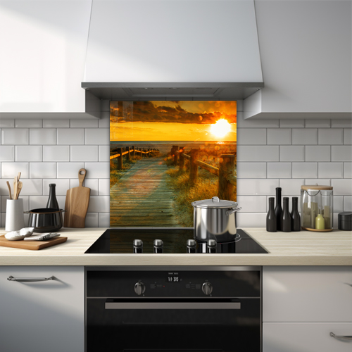Sunset at the beach with a wooden path glass splashback.