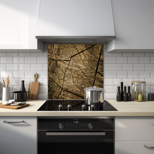 Close-up of aged, dark wood with diagonal lines glass splashback.