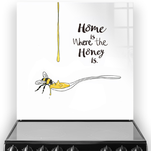 Modern white glass kitchen splashback with bee and honey design and "Home is Where the Honey is" script.