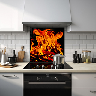 Close-up of wood on fire glass splashback. thumbnail