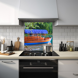 Glass splashback of a wooden boat with blue canopy on a serene lake. thumbnail